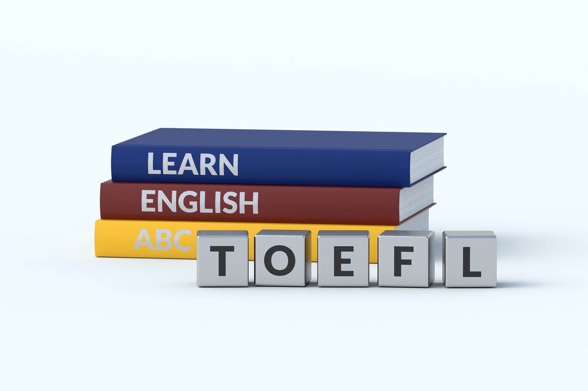 TOEFL inscription on cubes. The test of english as a foreign language. Education concept.
